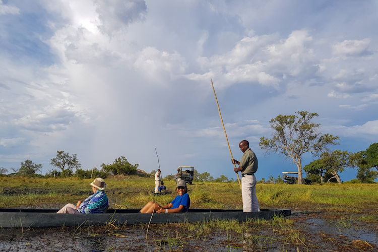 Okavango Delta photography Botswana Red Lechwe water channels sunrise mokoro sunrise golden hour