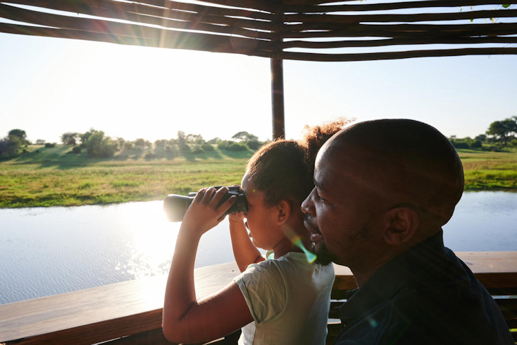botswana-family-safaris-10.jpg A family enjoying a safari in Botswana during their Botswana family safari adventure