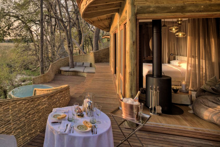 Sandibe Okavango Safari Lodge pangolin architecture golden weaver 22500 hectares private concession Botswana
