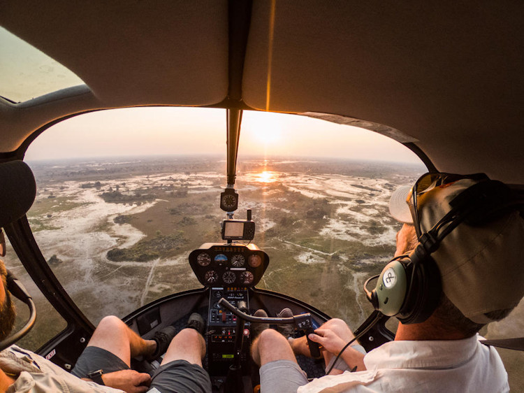Okavango Delta unique safari experiences mokoro walking horseback boat game drive Botswana