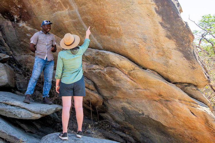 Okavango Delta cultural encounters traditional mokoro local guides village visits Botswana community