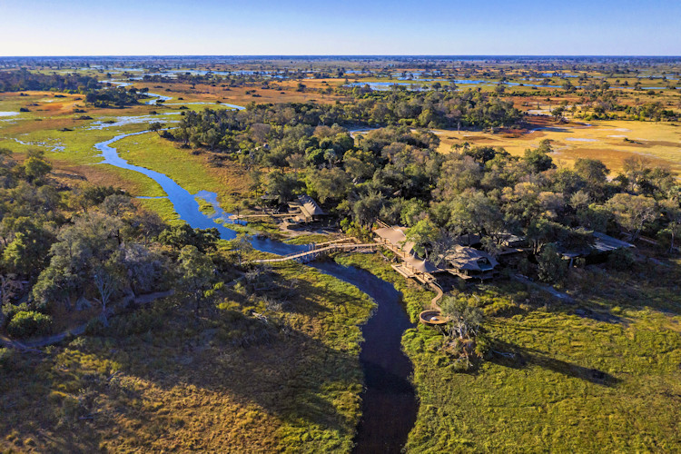 Xigera Safari Lodge 12 exclusive suites remote island Okavango Delta mokoro spa sleepouts Botswana