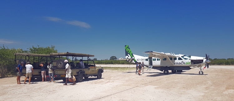 Light aircraft Botswana Okavango Delta 30 minute hop between camps lodges wildlife from above aerial