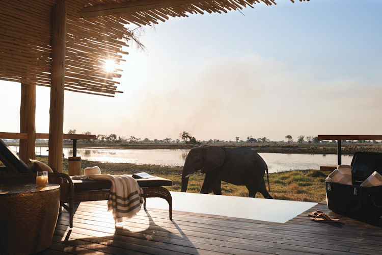 Luxury honeymoon suite Okavango Delta private plunge pool deck waterway views romantic Botswana