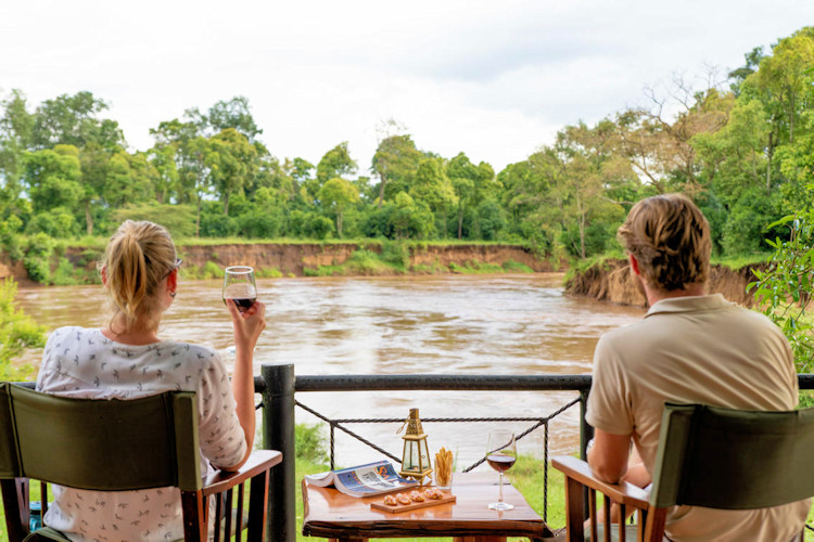 Governors' Camp Maasai Mara 1972 Mara River hippos crocodiles warthogs luxury tents historical Kenya