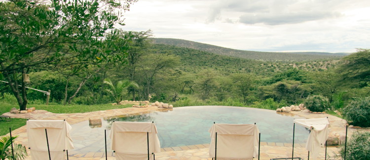 Cottars 1920s Camp Kenya sweeping Masai Mara reserve views from tent base mountain private conservancy