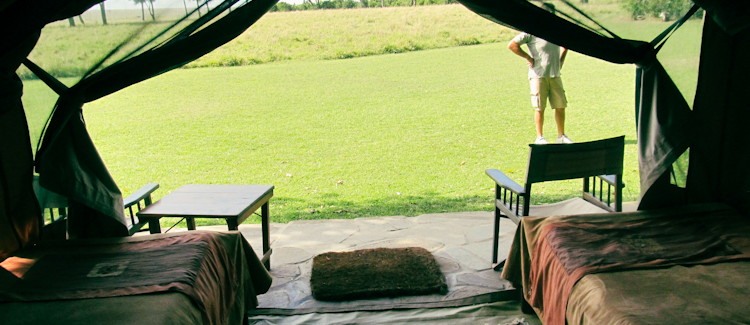 Little Governors Camp Kenya 17 tents intimate boat crossing marsh warthog piglets Tusker lager balloon safaris