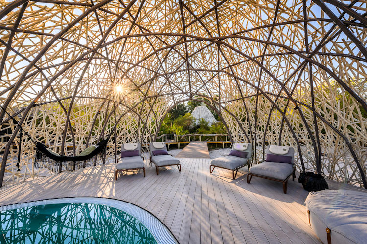 luxury-tented-safari-camps-in-africa-4.jpg Gourmet dining experience at a luxury tented camp, showcasing exquisite food amidst the African landscape.