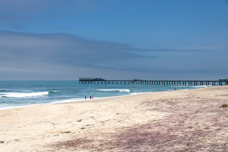 namibia-travel-bucket-list-2.jpg A serene beach scene in Swakopmund, showcasing the beauty of the coastal retreats in Namibia.