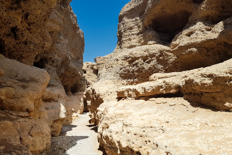 Sesriem Canyon Tsauchab River 30 metres deep 3km rugged geological formations ancient Namibia