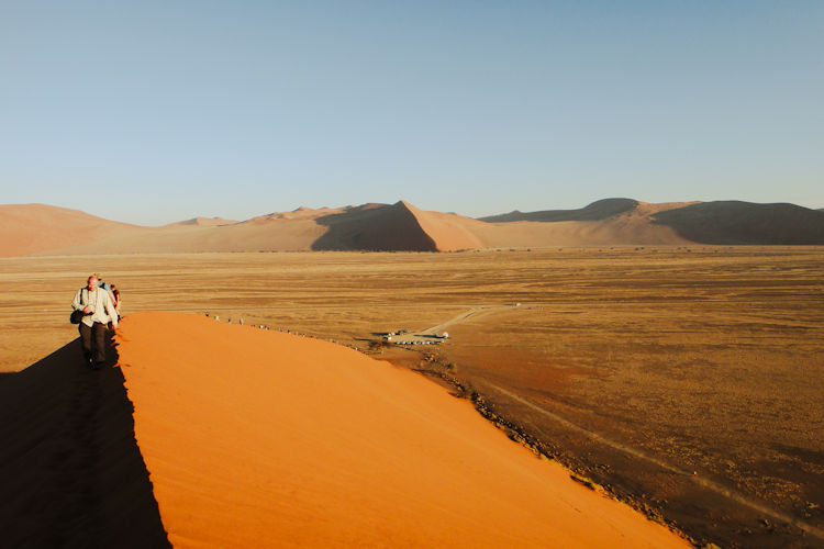 Adventure activities Namib Desert sandboarding quad biking hot air balloon scenic flight champagne