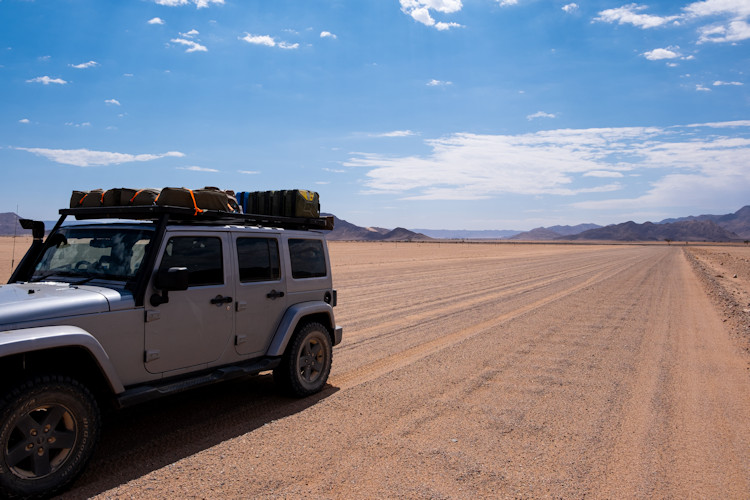 Road trip Namibia gravel road 4x4 vehicle Etosha Damaraland self-drive adventure