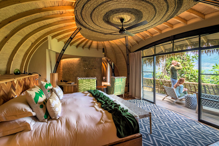 Wilderness Bisate Lodge six villas eroded volcanic cone 60000 indigenous trees rewilding Rwanda