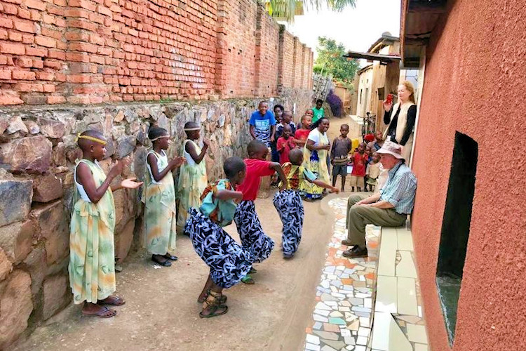 Kigali Rwanda vibrant capital arrival city tour Genocide Memorial Kimironko Market local cuisine