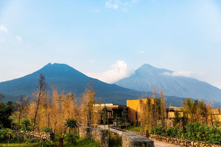 Gorilla trekking Volcanoes National Park Rwanda Singita Kwitonda Lodge mountain gorillas eight people