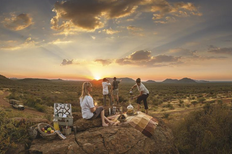 Tuningi Safari Lodge Madikwe family-friendly luxury suites waterhole deck Big Five sunrise sunset game drives