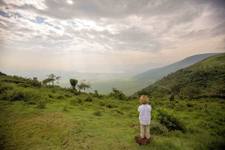 A family exploring the Ngorongoro Crater with kids on a tanzania family safari.