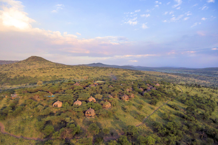 andBeyond Grumeti Serengeti River Lodge riverside tented suites private patio wildlife views Tanzania