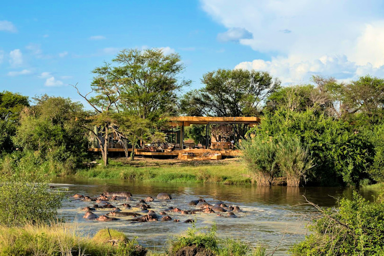 andBeyond Grumeti Serengeti River Lodge riverside tented suites private patio wildlife views Tanzania