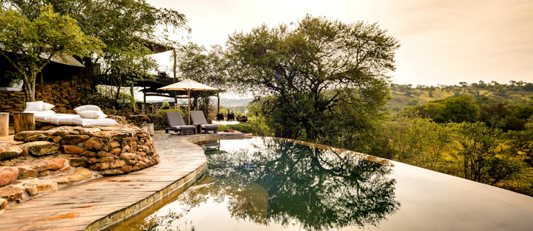 Singita Faru Faru Lodge Grumeti Reserve 350000 acres pool firepit 9 suites Serengeti Tanzania