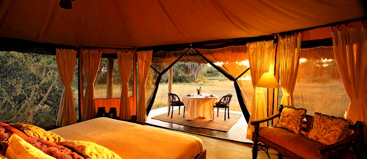 Siwandu Camp Lake Nzerakera palm grove 9 suites unfenced Selous Game Reserve Tanzania