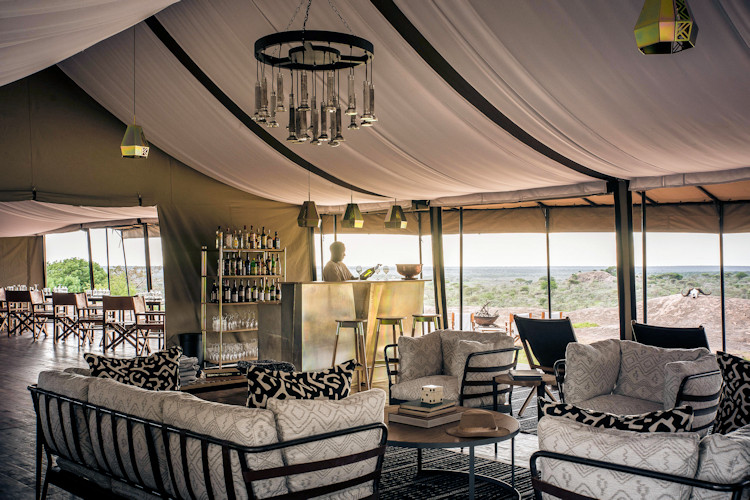 Serengeti luxury lodge private plunge pool viewing deck sundowners firepit Tanzania