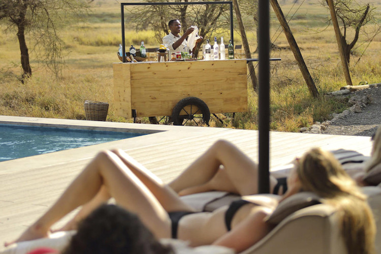 Couple planning Tanzania honeymoon map visa budget dry season June October
