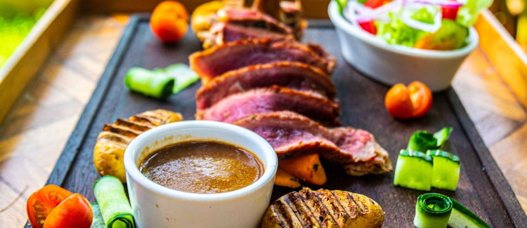Le Chateau Brasserie Belge Kampala Belgian restaurant thatched cottages Le Petit Village beef fillet Uganda