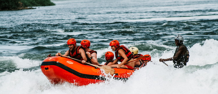 White water rafting Uganda BBQ buffet lunch ice cold beer Jinja Nile River end 25km journey Uganda
