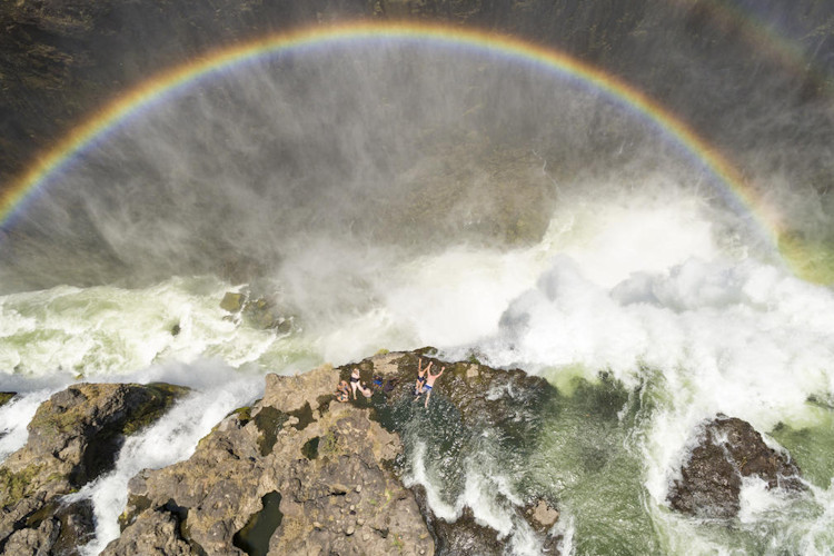 Devil's Pool Victoria Falls natural pool edge swimming guided tour hippo crocodile boat Zambezi Zambia