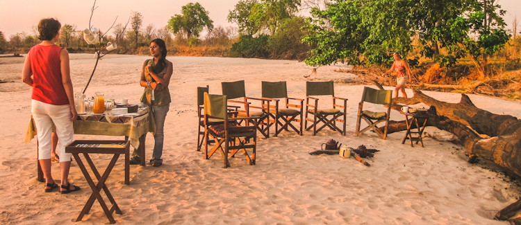Tribal Textiles South Luangwa Zambia Mfuwe hand-painted fabrics 150 staff fair trade Malimba school curio shop
