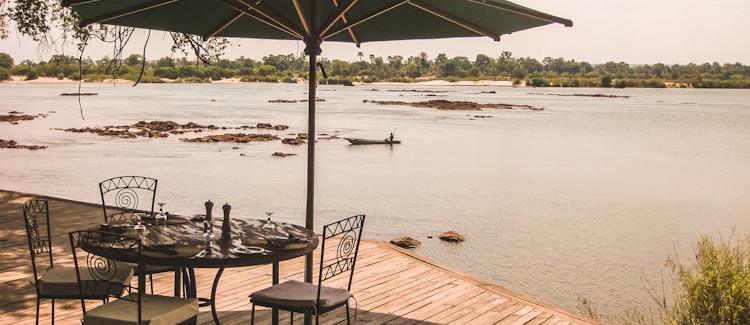Tongabezi Lodge Zambia houses cottages local materials private terrace river dining sundowner boating activities