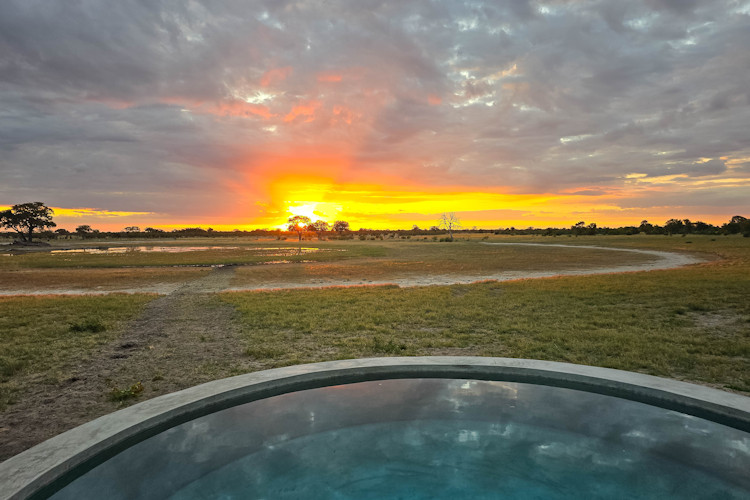 Best time visit Hwange Kruger dry season May October peak season wildlife waterhole viewing