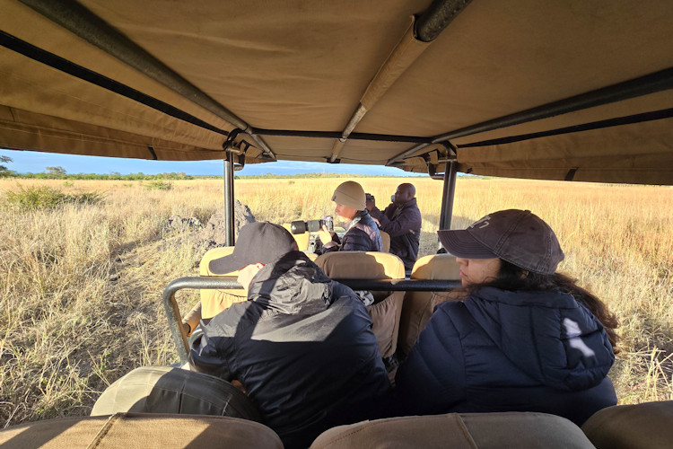 Positive impact local communities Hwange Kruger tourism conservation jobs education healthcare