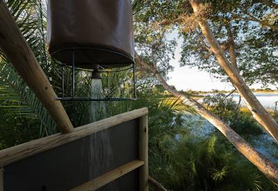 Rustic outdoor shower in the Okavango Delta