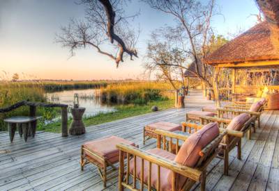 Sun loungers overlooking Xakanaxa Lagoon
