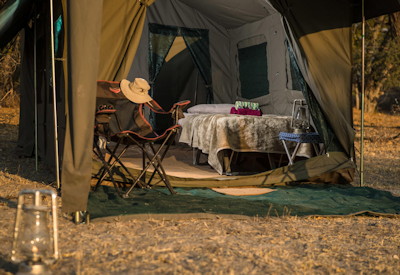 Luxury tented bedroom Tau Pan Lodge ancient dune sweeping views Central Kalahari Botswana