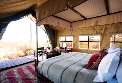 Camp Kalahari Makgadikgadi Pans quad bike horse riding Bushmen walks family Botswana