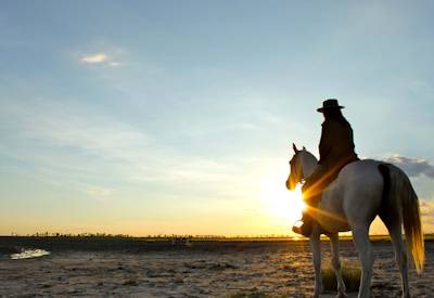 Sunset Makgadikgadi Pans horse riding safari Kalahari Botswana family adventure
