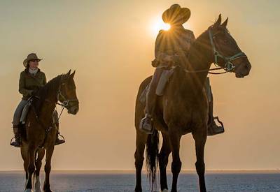 Zu Hoansi Bushmen village finale horse riding Makgadikgadi Pans Kalahari Botswana
