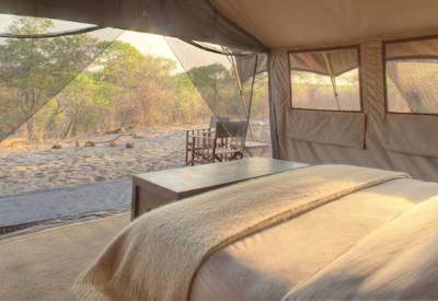 Luxury Hemingway-style tented suite Khwai Moremi Game Reserve Botswana fly-in safari