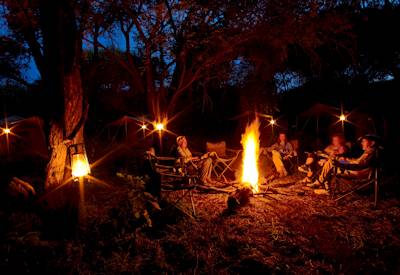 Sundowner drinks Khwai River floodplains Botswana Miracle Rivers mobile safari