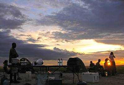 Sunset drinks Trans Kalahari Safari Mabuasehube Khutse Central Kalahari Botswana camping