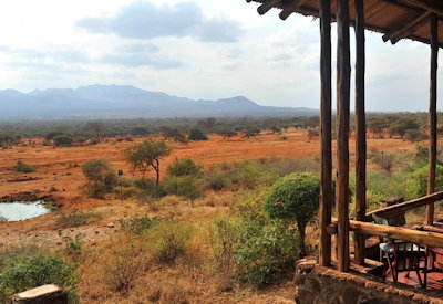 A safari lodge with views of the Chyulu Hills