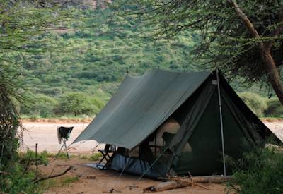 Mobile tented safari camp on the banks of a river