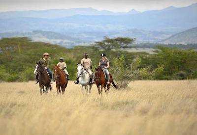Horse riding on the plains of Kenya