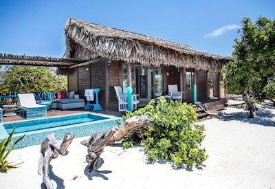 Anantara Medjumbe Island Resort villa crisp blues whites en-suite indoor outdoor shower