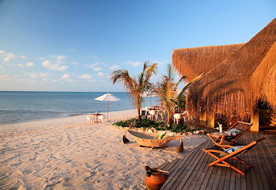 Azura Benguerra Lodge villa interior thatched jekka roof locally sourced wooden beams