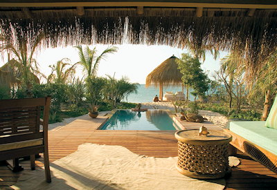 Azura Benguerra Lodge candlelit beach dinner under stars Bazaruto Archipelago Mozambique