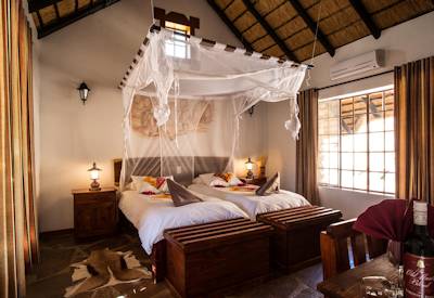 Thatched bedrooms with twin beds